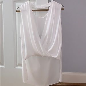 hi-low swoop neck blouse with open back